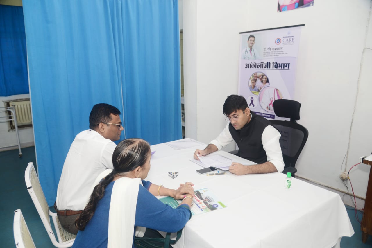 Dr. Ravi Jaiswal consulting patients at his clinic